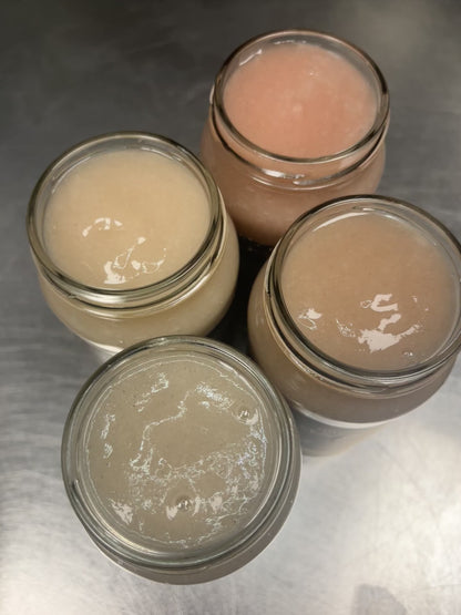 Four Jars of Original Sea Moss Gel showing the color range